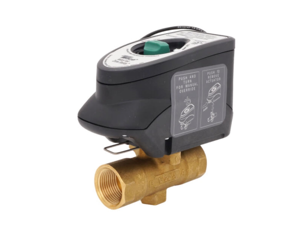 An isolated high-resolution studio product shot from image_90cb3c.jpg of a Taco Multi-Volt Zone Sentry motorized zone valve, highlighting its solid forged brass body with female NPT threaded connections and its advanced grey and black universal line-voltage electronic actuator head assembly with a top-mounted green dial indicator.