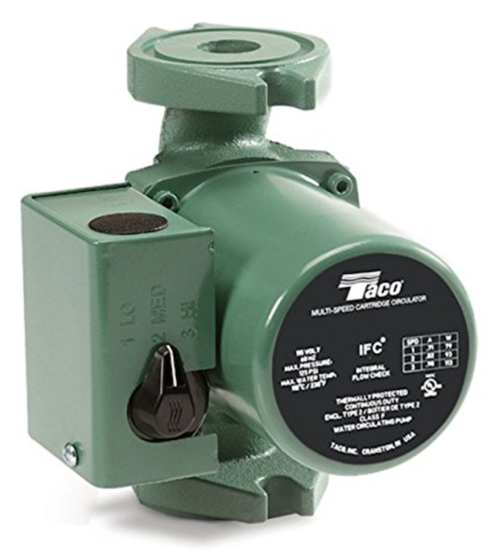 Front perspective studio shot of a Taco 0015-MSF3-IFC 3-speed cast iron circulator pump, highlighting its classic unpainted forest green motor housing, standard flat two-bolt flange openings, and the black capacitor junction box equipped with a black speed-setting dial on a plain white backdrop.