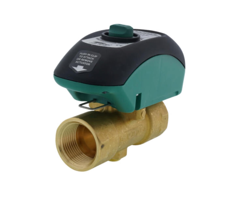 Full product assembly profile of a Taco Zone Sentry 1-inch motorized zone valve featuring its signature green-and-black actuator casing mounted securely on a solid brass 1 inch threaded female NPT ball valve body.